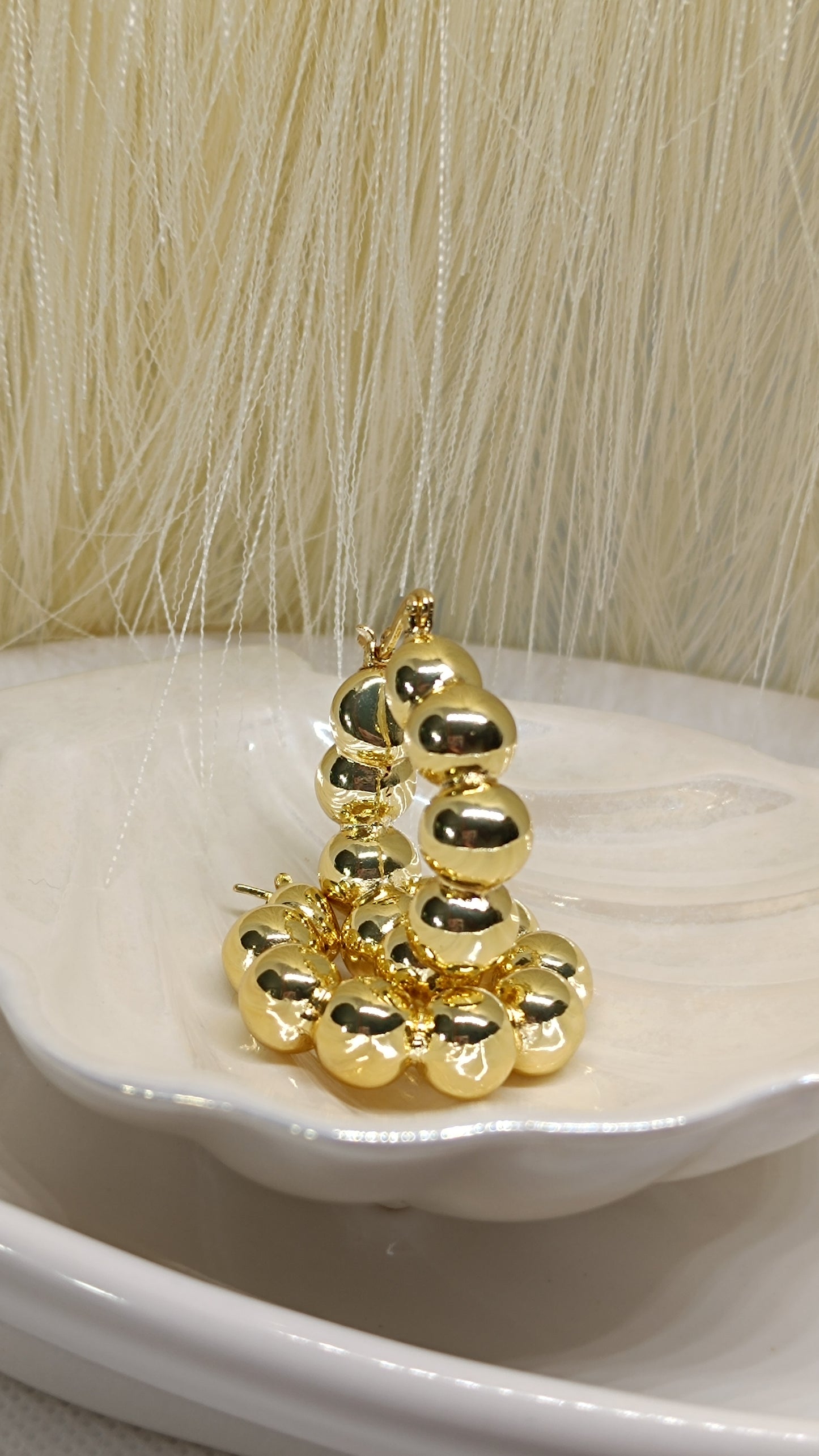 Argollas con diseño de balines