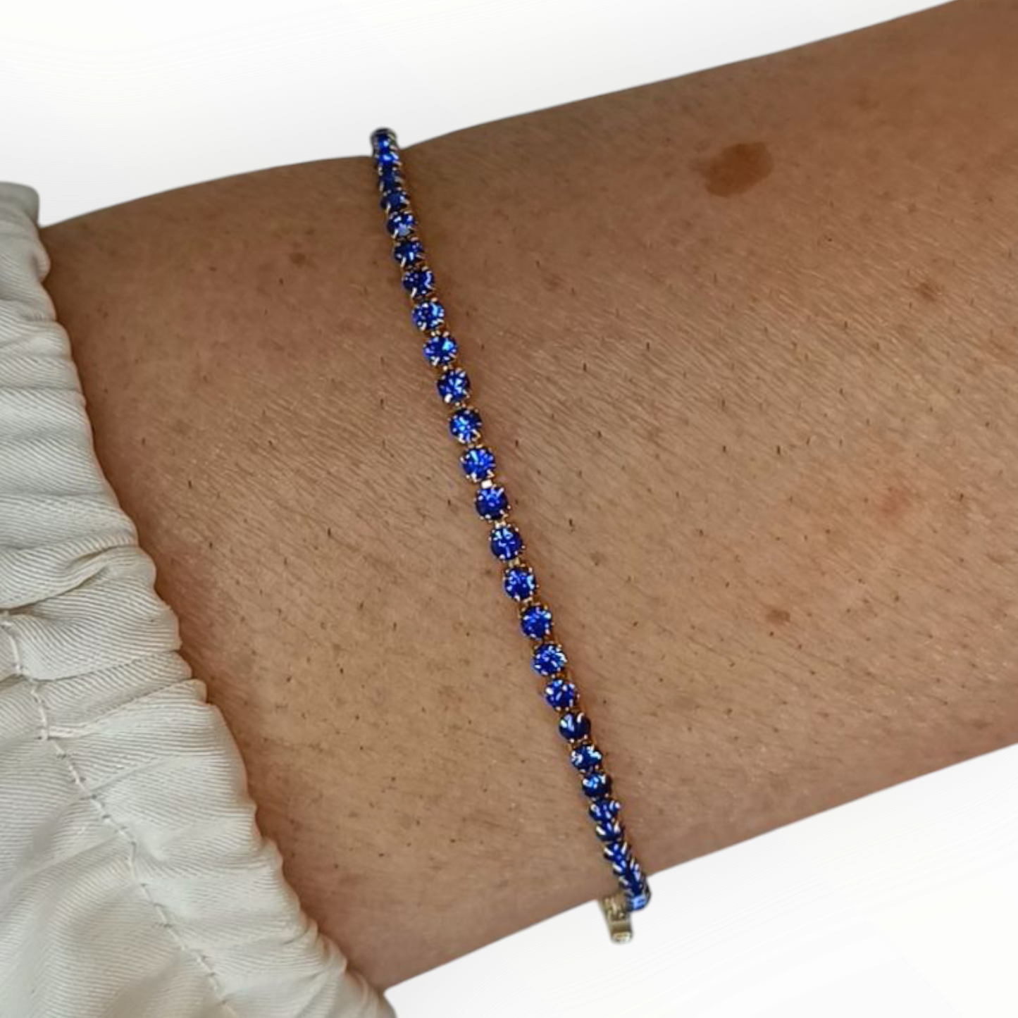 Brazaletes diseño tenis con zirconitas en color azul