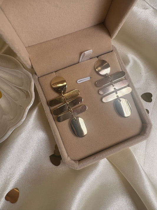 Aretes colgantes en dorado